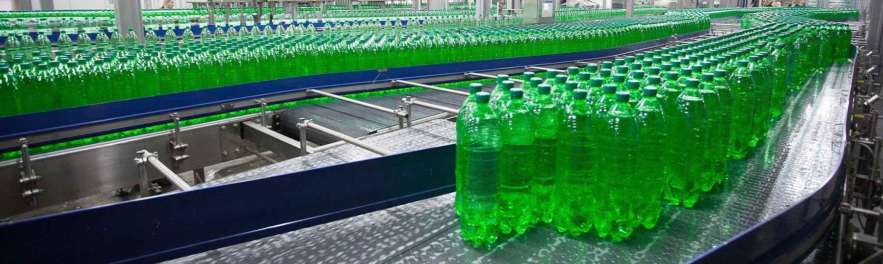 Conveyor belt with lubrication spray nozzles